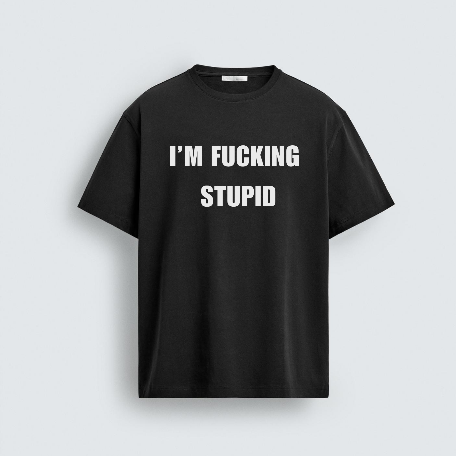 Black oversized unisex t-shirt with bold white text reading "I'M FUCKING STUPID" printed across the chest. Part of a two-piece couple's combo tee set.