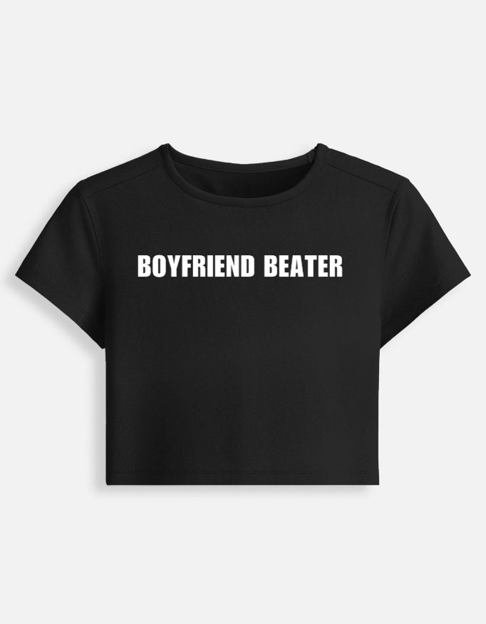 A black, cropped baby tee with a snug fit featuring "BOYFRIEND BEATER" printed in bold white text across the front.