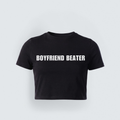 A black, cropped baby tee with a snug fit featuring "BOYFRIEND BEATER" printed in bold white text across the front.